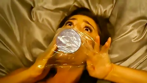 Gagged With A Dildo