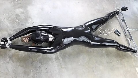 Rubber-bound Girl In Electro Play